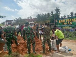 Karya Bakti Koramil 431-01/Jebus–Parittiga Perbaiki Jalan Putus Akibat Banjir